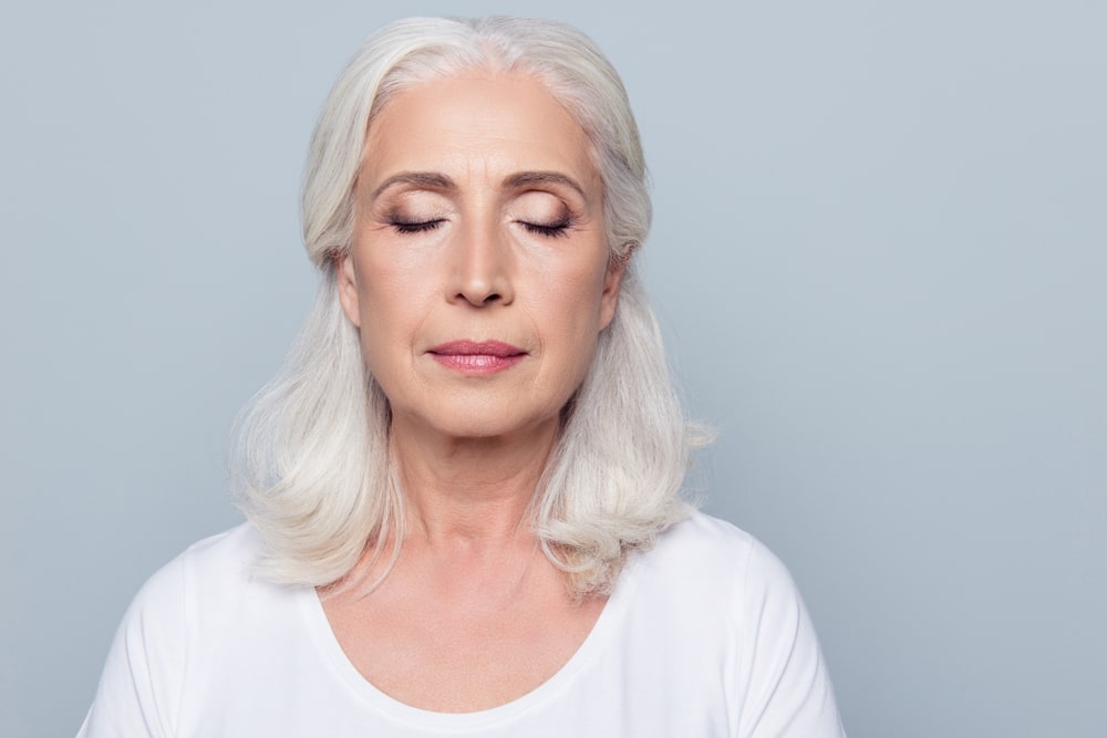 Close,Up,Portrait,Of,Confident,Concentrated,Mature,Woman,With,Wrinkles